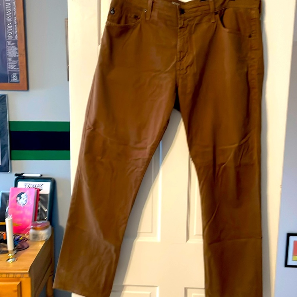 AG Tan Everett jeans.